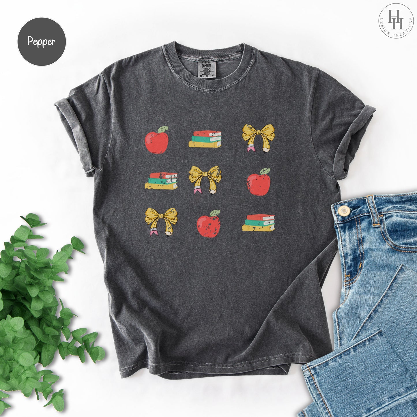 dark grey t-shirt with colorful graphics on a white background